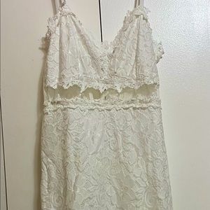 Beautiful white dress. Good for white parties and dinners. Good condition.